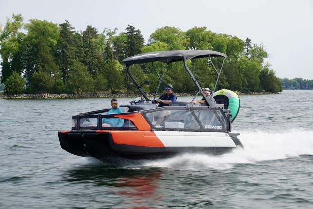 sea-doo pontoon boat on lake