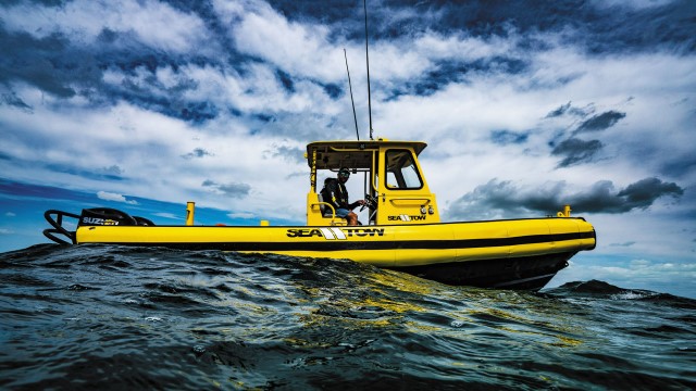 sea tow 40th anniversary yellow boat